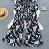 Spring and Autumn Retro V-neck Floral Long-sleeved Jumpsuit Women's Lantern Sleeves Pleated Niche Design Waist Wide-leg Pants